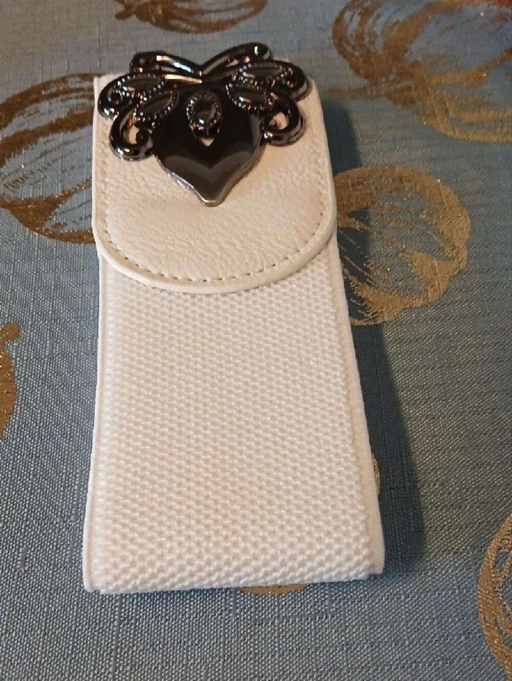 White Elastic Women's Belt with Decorative Silver Buckle. Never Worn.